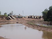 Floods threaten more further south