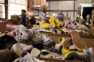 Unloading shoes donated by church in Texas (Photo by Buckner International)