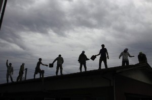 A disaster relief work team helps churches rebuild.  (Image courtesy Asian Access) 