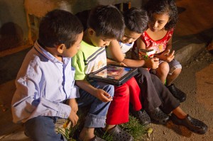 Children watching the "JESUS" film  (Photo courtesy The JESUS Film Project)
