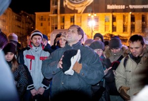 Pastor praying in Kiev in the midst of political revolution.  (Image courtesy EFCA ReachGlobal)