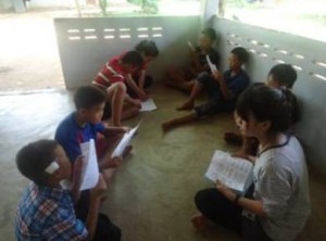 Kids gather for the daily study of God's Word.  (Image courtesy AMG)