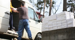 Workers unload Gospels of John for distribution.  (Image captured from screenshot of Russian Ministries' video)
