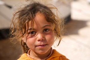 Why are these children pulling a longer work day than most adults? (Photo courtesy of IMB students)