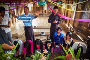 Indigenous pastors pray over their congregation.  (Photo courtesy of Christian Aid Mission)