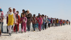 Syrian children march in the refugee camp in Jordan.  (Photo © 2013 IMB / IMB file photo)