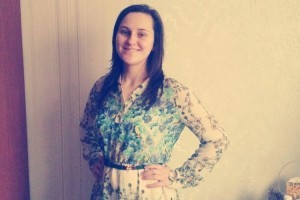 Ann had never owned a dress until SGA partners made it possible through Orphans Reborn. She is now a joyful, zealous Orphans Reborn ministry team member. (Photo courtesy Slavic Gospel Association)