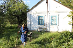 Vera by home in Eastern Ukraine. (Photo courtesy of Mission Eurasia) 