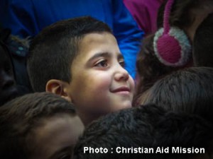 A children's program organized by an indigenous ministry in Syria brings a smile to a little one. (Photo, caption courtesy Christian Aid Mission) 