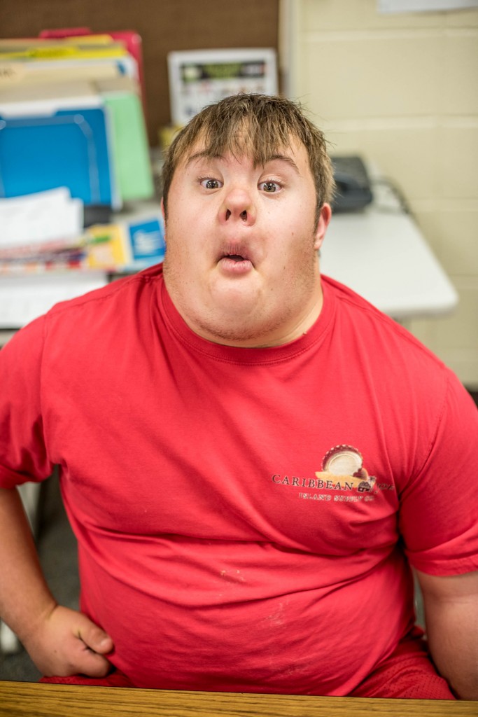 Andrew, a student Lincoln Schools, makes a silly face for his picture. 