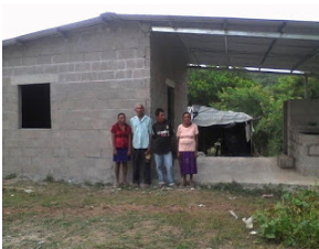 The work in Choluteca includes helping the impoverished rebuild better houses (Photo courtesy of Overholts). 