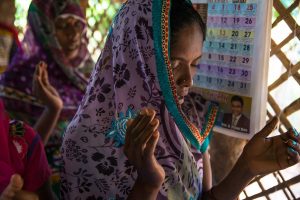 Indian woman, praying, prayer, worship, praise, singing, raised hands