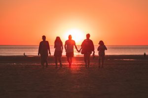 Unsplash, family, friends, beach, water, sand, holding hands, walking