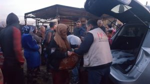 HFL_delivering aid to tent fire victims