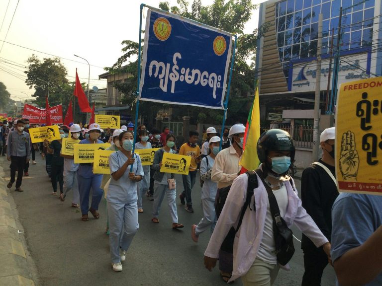 Myanmar Now Urban monks, health and education staff, and university students march in anti-dictatorship protest in Amarapura, Mandalay on March 12. (Photo courtesy of Prachatai/Flickr/CC2.0)