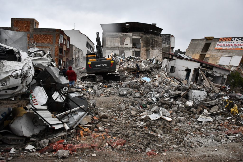 Buildings destroyed against gray sky