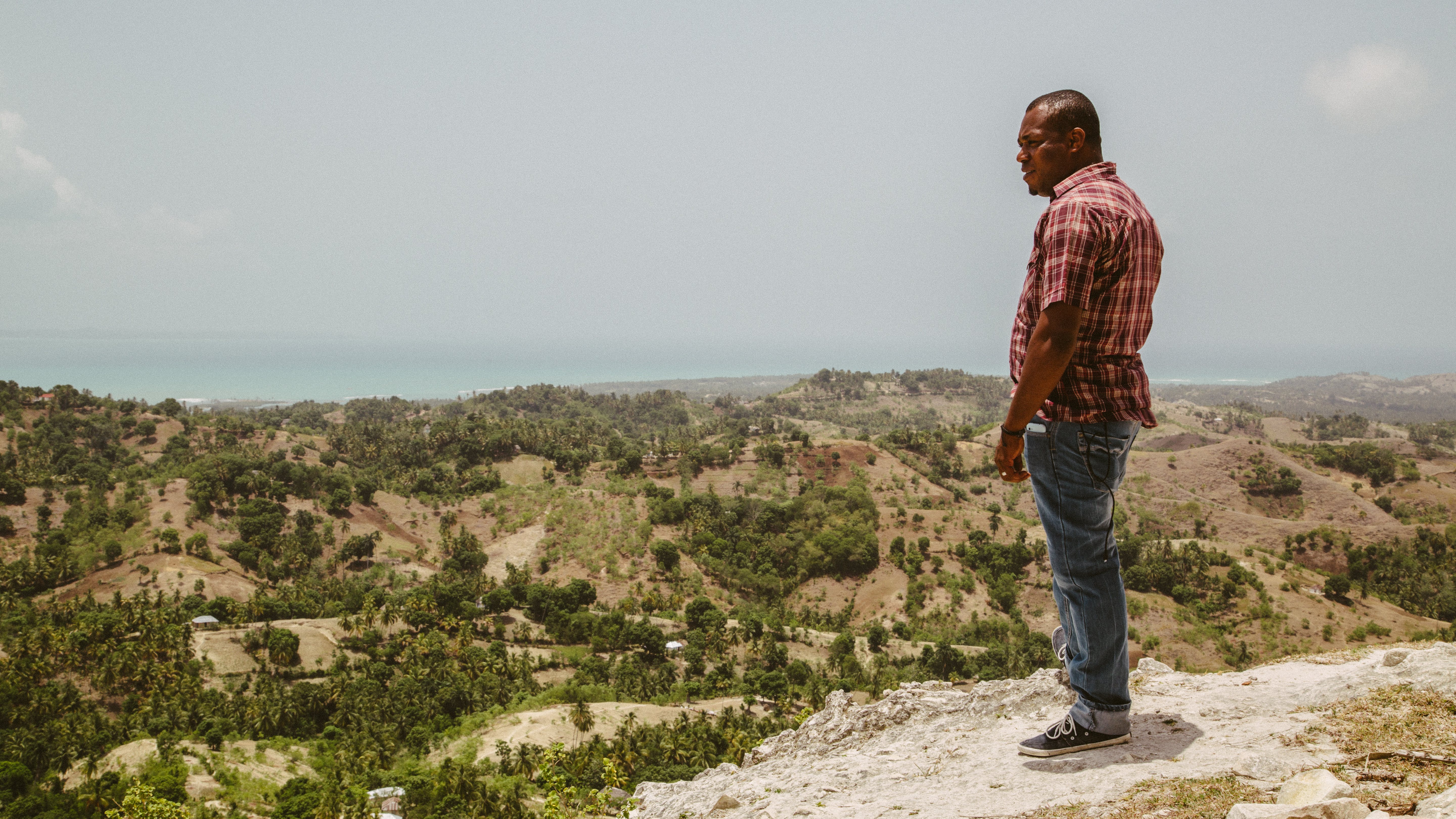 person overlooks haiti