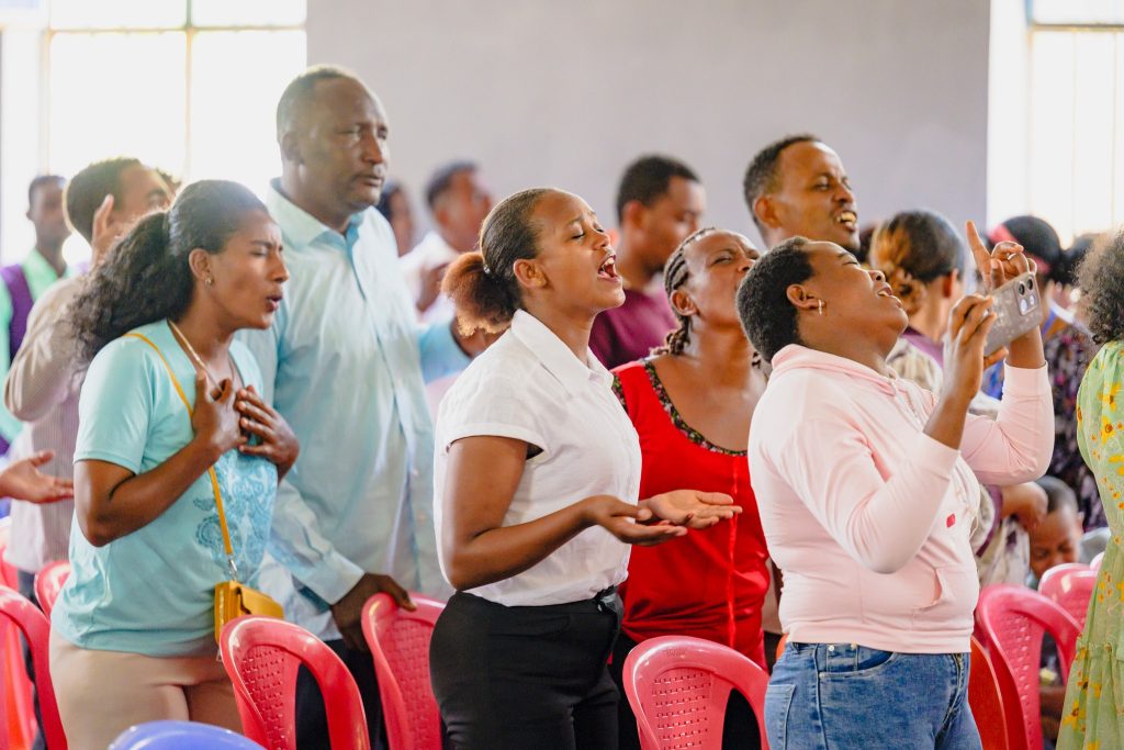 people worshipping
